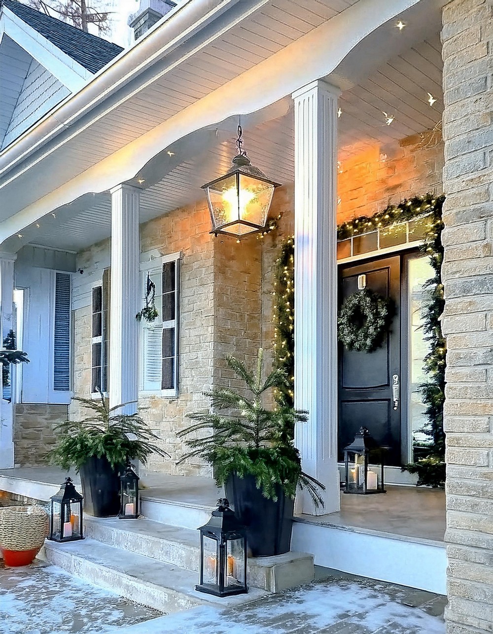 Elegant Front Door Look with Black Planters and Lanterns