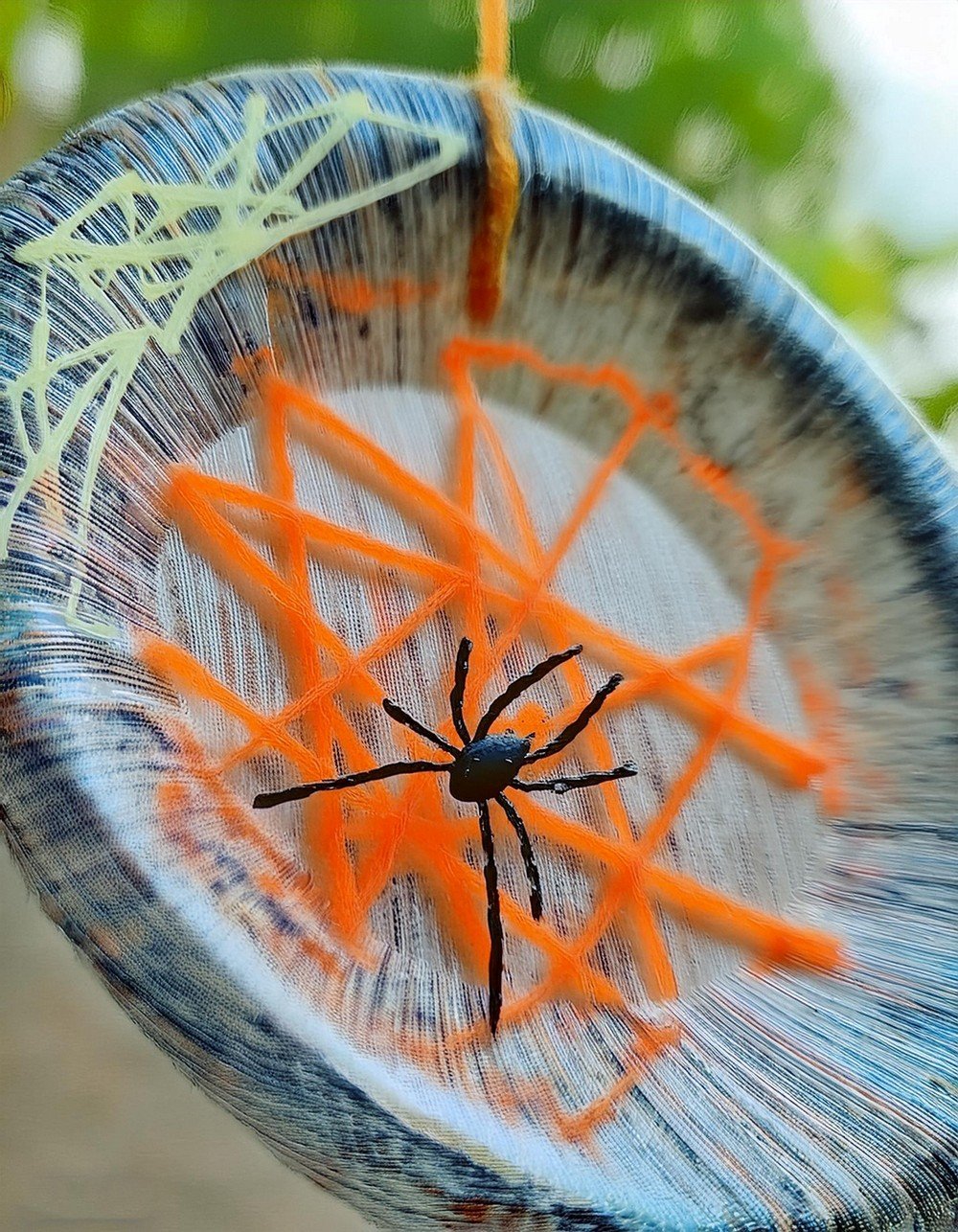 Transform Paper Plates into Spider Web Decor