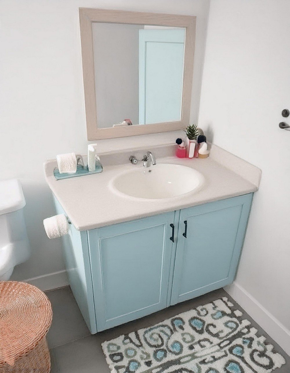 A Bathroom Vanity With A Farmhouse Look