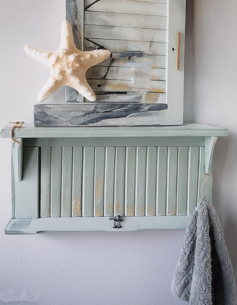 Wooden Window Shutter Becomes Extra Towel Rack