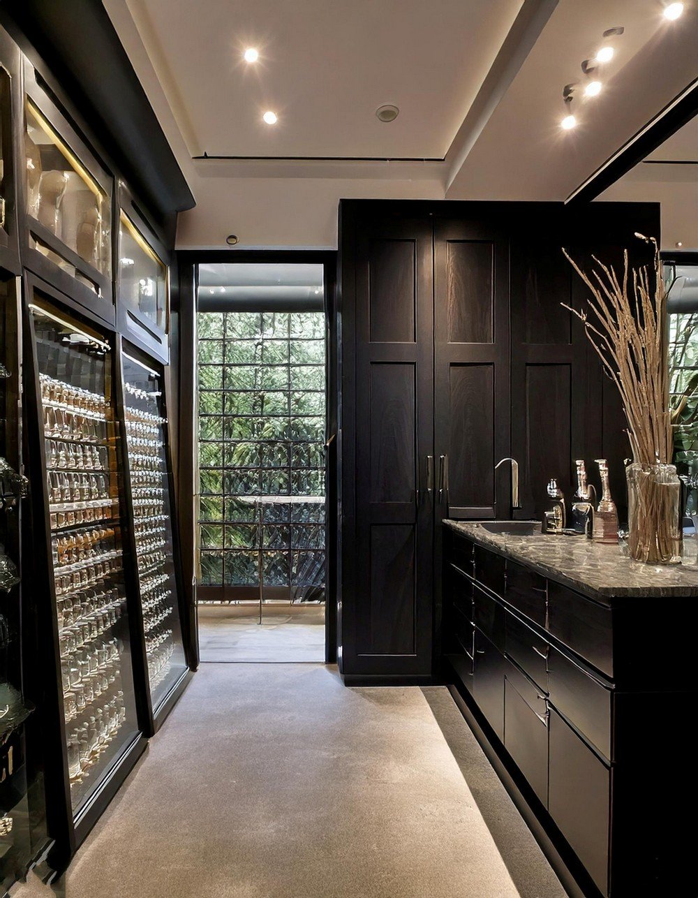 Classic Basement Bar Design With Glass Cabinets For Bottle Shelve