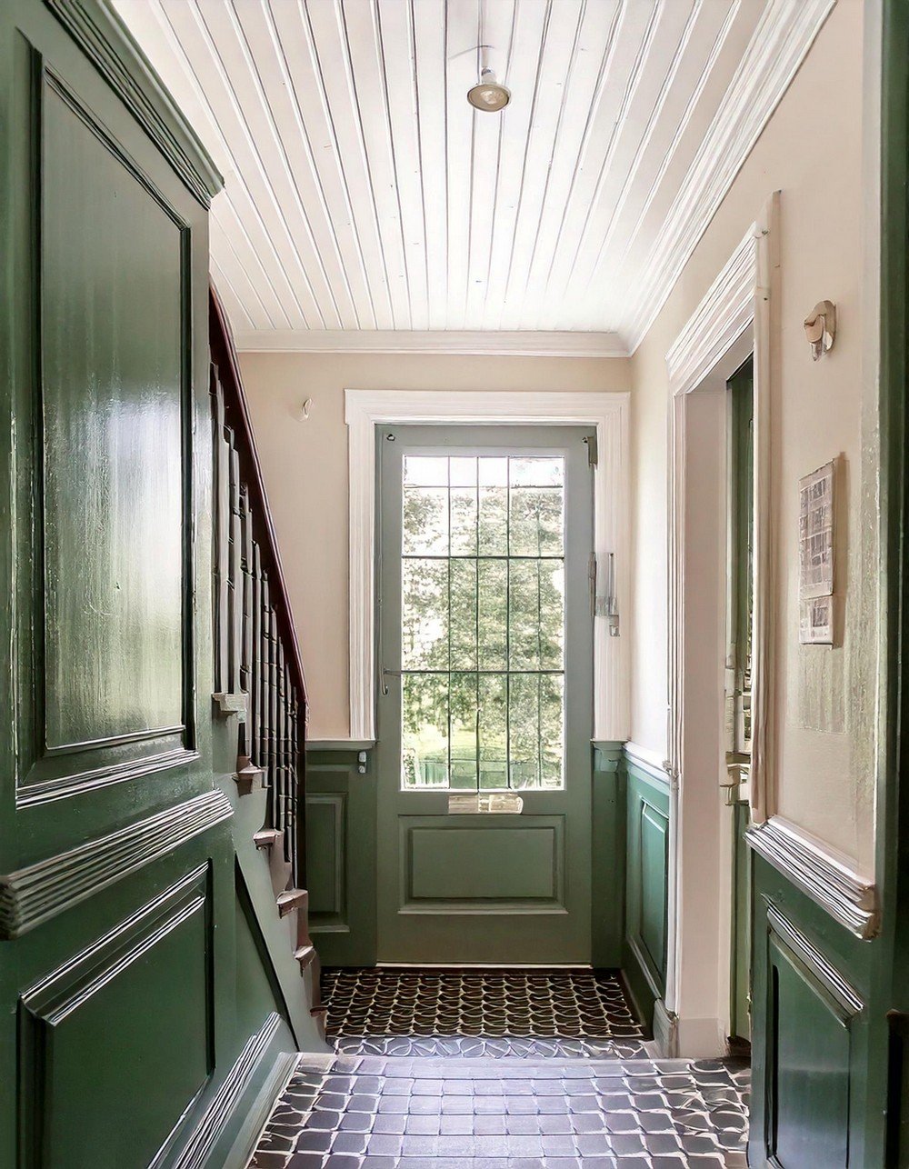 Small Space Entryway Interior Design With Green Wainscoting And Checkerboard Flooring